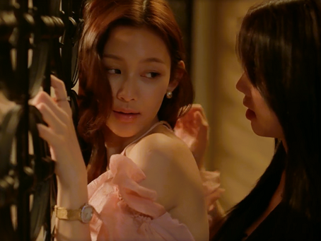 Song approaches Piang from behind in a hotel room during the pair’s anonymous first encounter in Chasing Love Episode 1, as tension builds between them.
