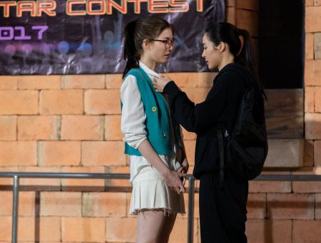Tawan pins her class pin on Ira’s shirt as a good luck charm before disappearing in Only You EP1.
