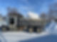 Tandem dump truck hauling snow for snow hauling services in Morris, Manitoba by Xtraordinaire Landscapes