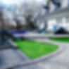 Backyard putting greens installed poolside, professionally crafted by trained landscaping team in Winnipeg, Manitoba