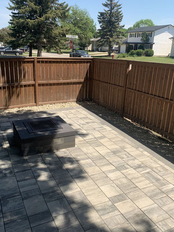 Professional Firepit Installation in Winnipeg, Manitoba by Xtraordinaire Landscapes