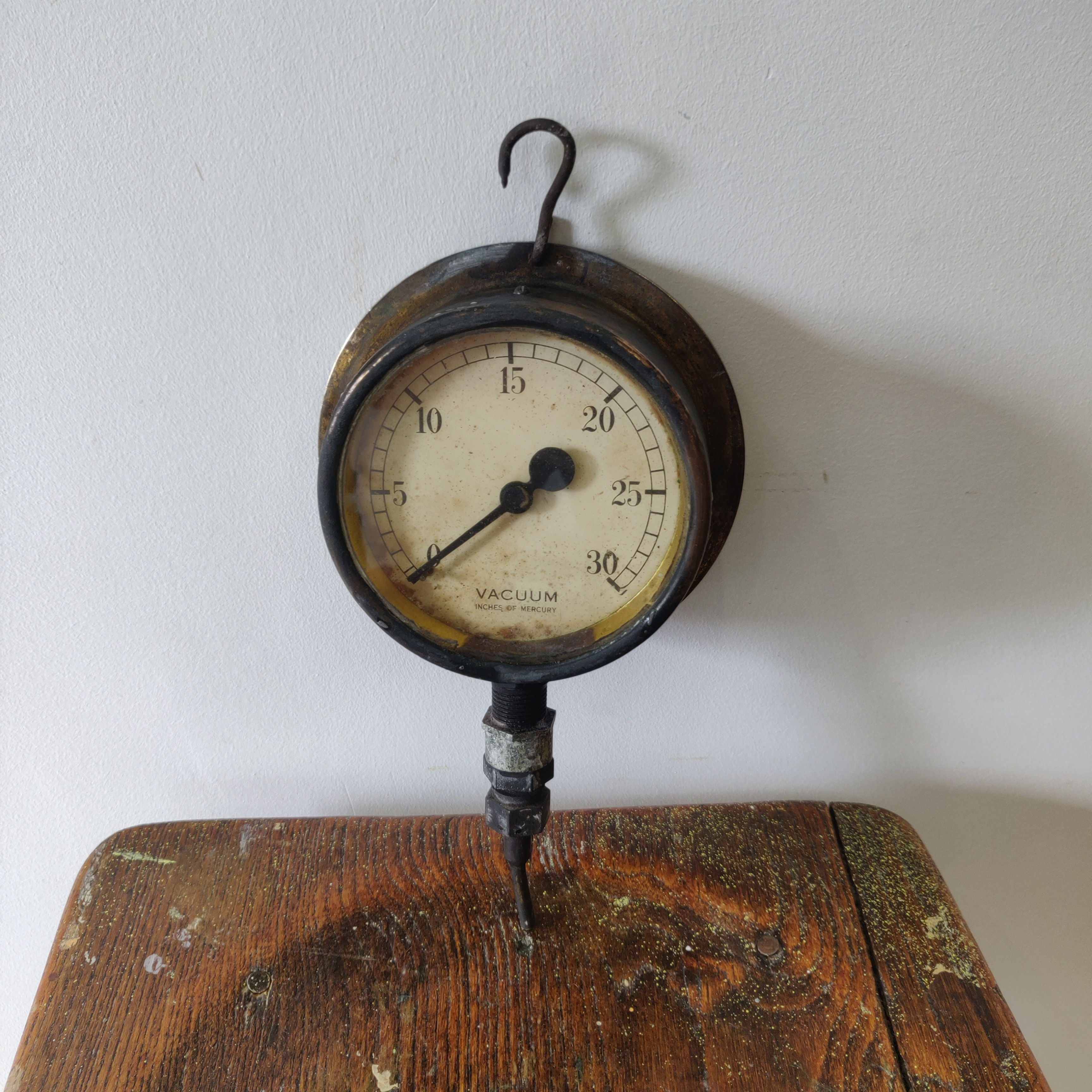 Antique early 20th century vacuum gauge showing inches of pressure brass steel