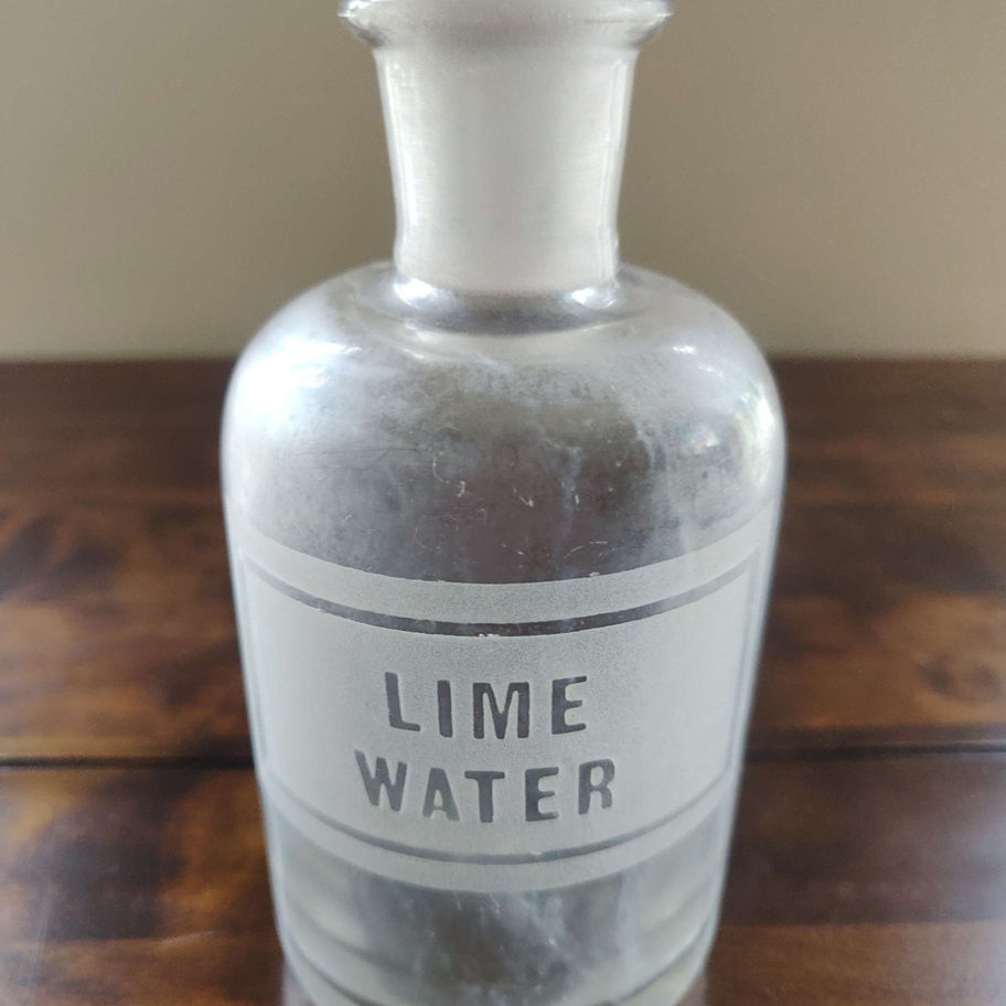 Lime water apothecary glass bottle