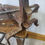 Thumbnail: Antique early 20th century pair of firedogs or andirons unusual holders castiron