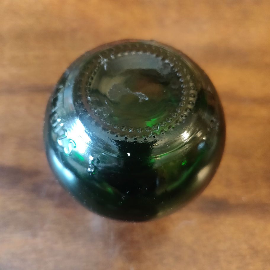 Vintage 1990s Szegeti Austrian wine sample green round bottle