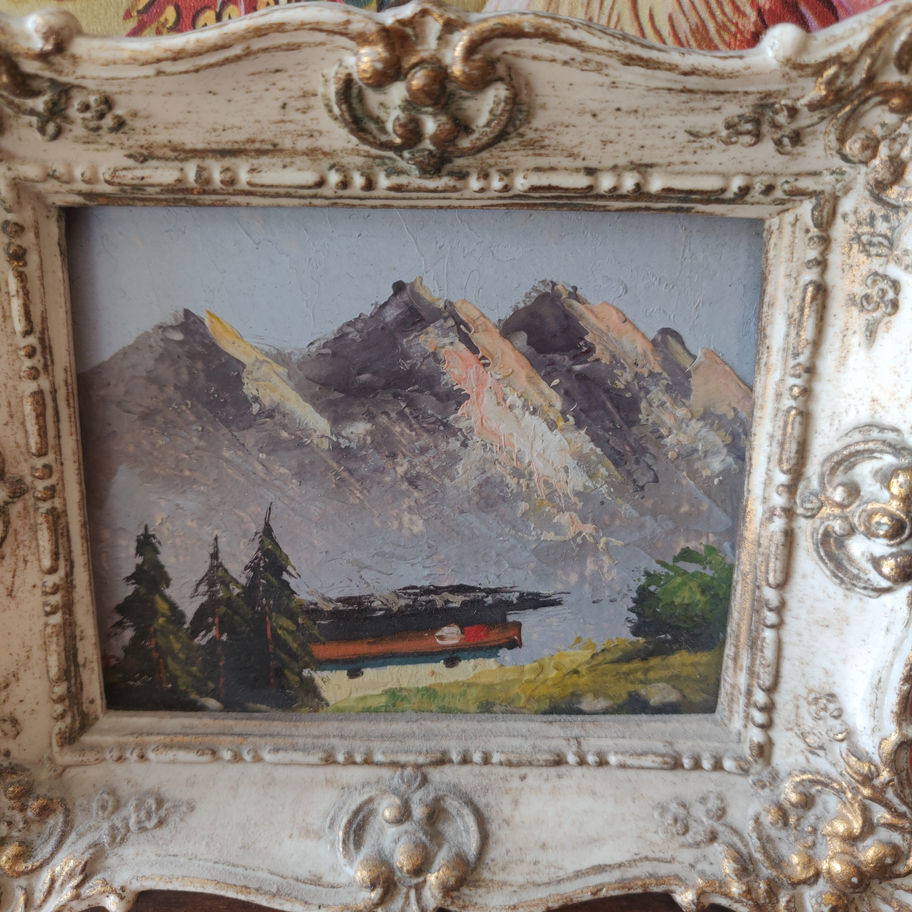 Vintage pair of hand painted oil on board miniatures depicting the swiss alps