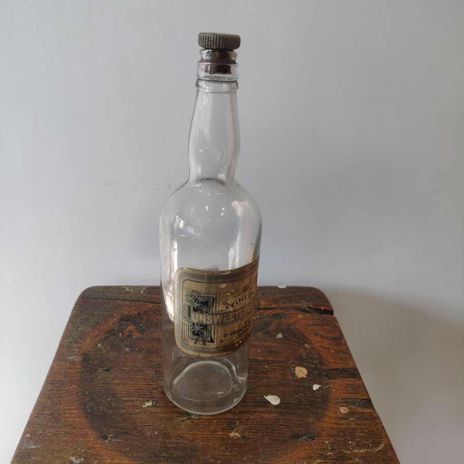 Vintage May be older B. Grant co unsweetened gin bottle with original stopper!!