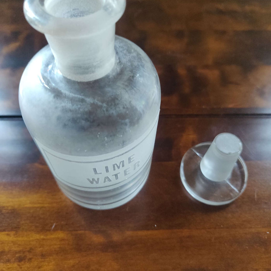 Lime water apothecary glass bottle