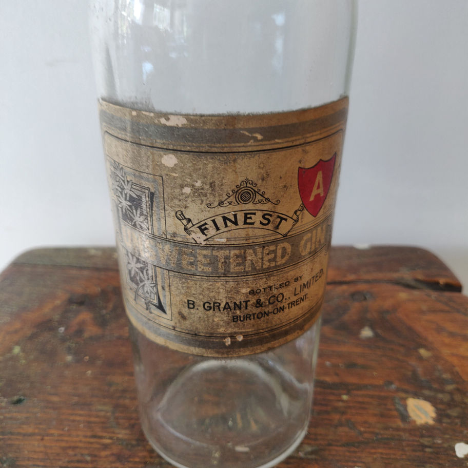 Vintage May be older B. Grant co unsweetened gin bottle with original stopper!!