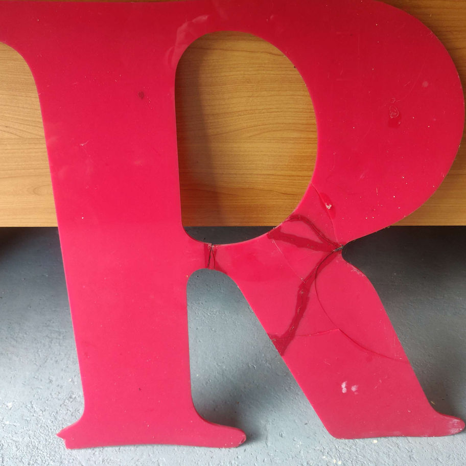 Large red perspex letters