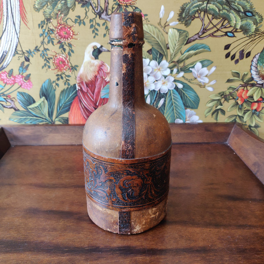Vintage Italian leather bound glass decanter lovely decorative item