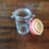 Thumbnail: Vintage glass spice jar with metal closing and red top