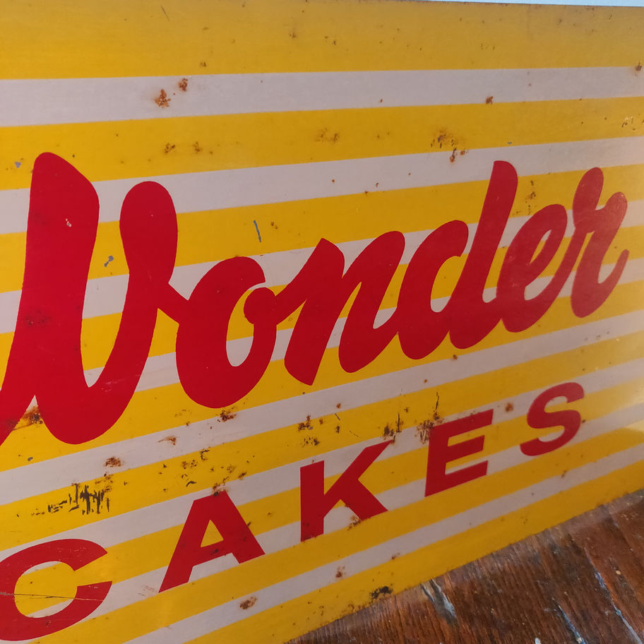 Vintage metal incredibly vibrant Wonder Cakes sign