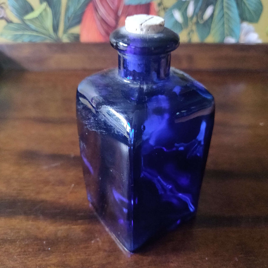 Vintage small cobalt blue bottle with cork stopper