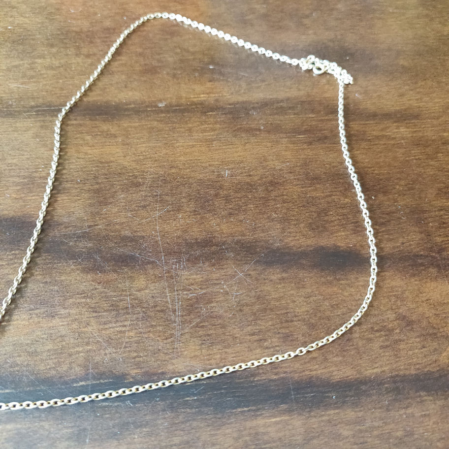 Vintage magnifying glass on a chain jewellers loupe