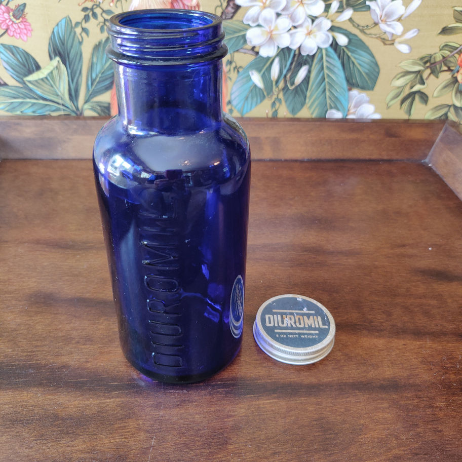 Vintage could be older Diuromil cobalt blue medicine bottle rare with lid