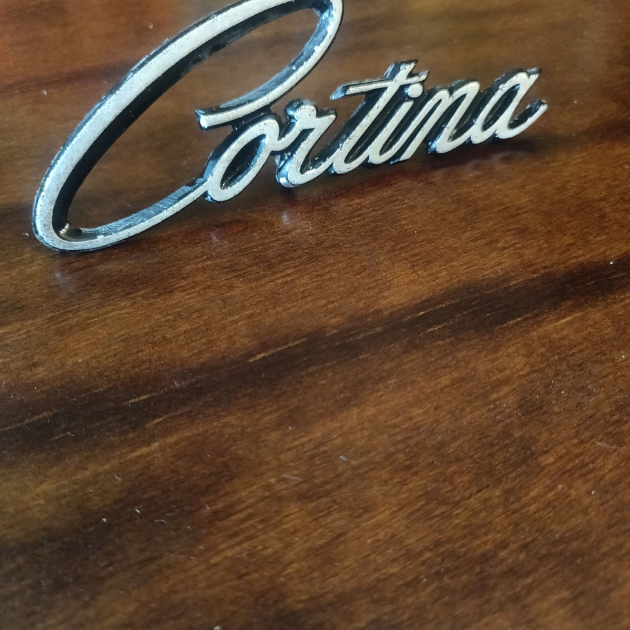 Vintage original not reproduction Ford cortina metal badge