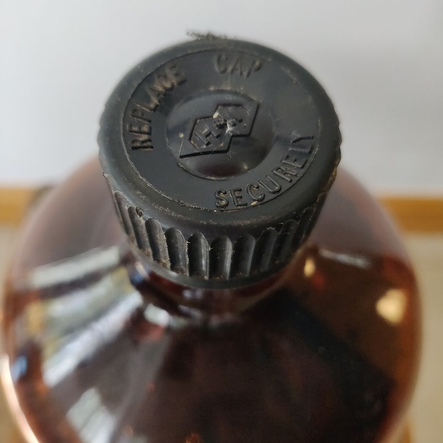 Vintage pair of large apothecary chemist bottles remnants of labels remaining