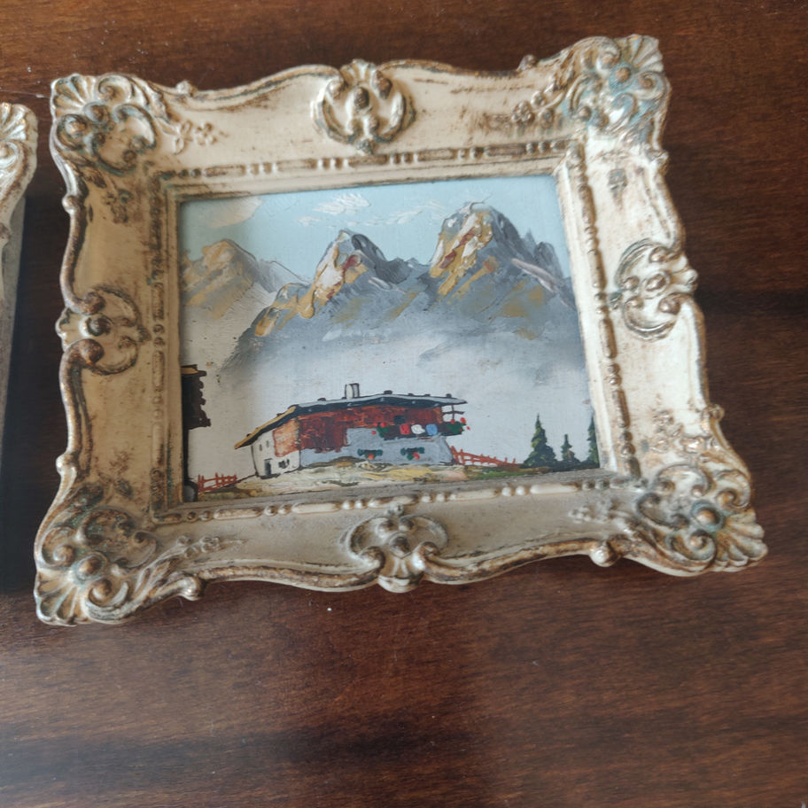 Vintage pair of hand painted oil on board miniatures depicting the swiss alps