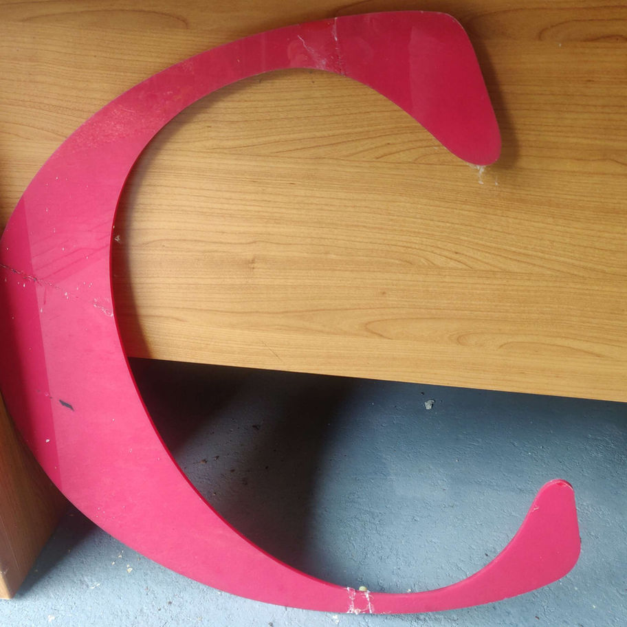 Large red perspex letters