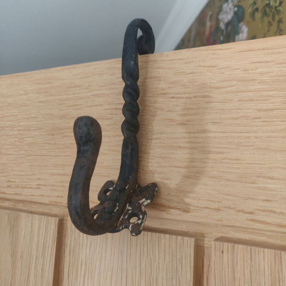 Antique wrought iron hand made by a blacksmith very decorative coat hook
