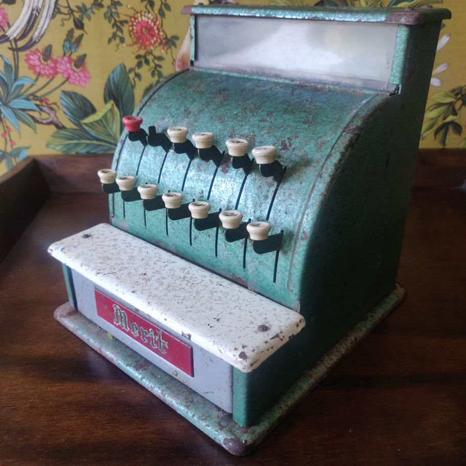 Vintage merit metal toy cash register makes a lovely cha ching sound !!
