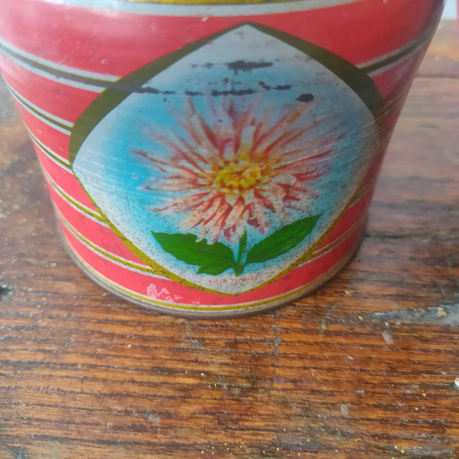 Vintage Kemp's chocolate biscuit tin showing Dahlia flowers