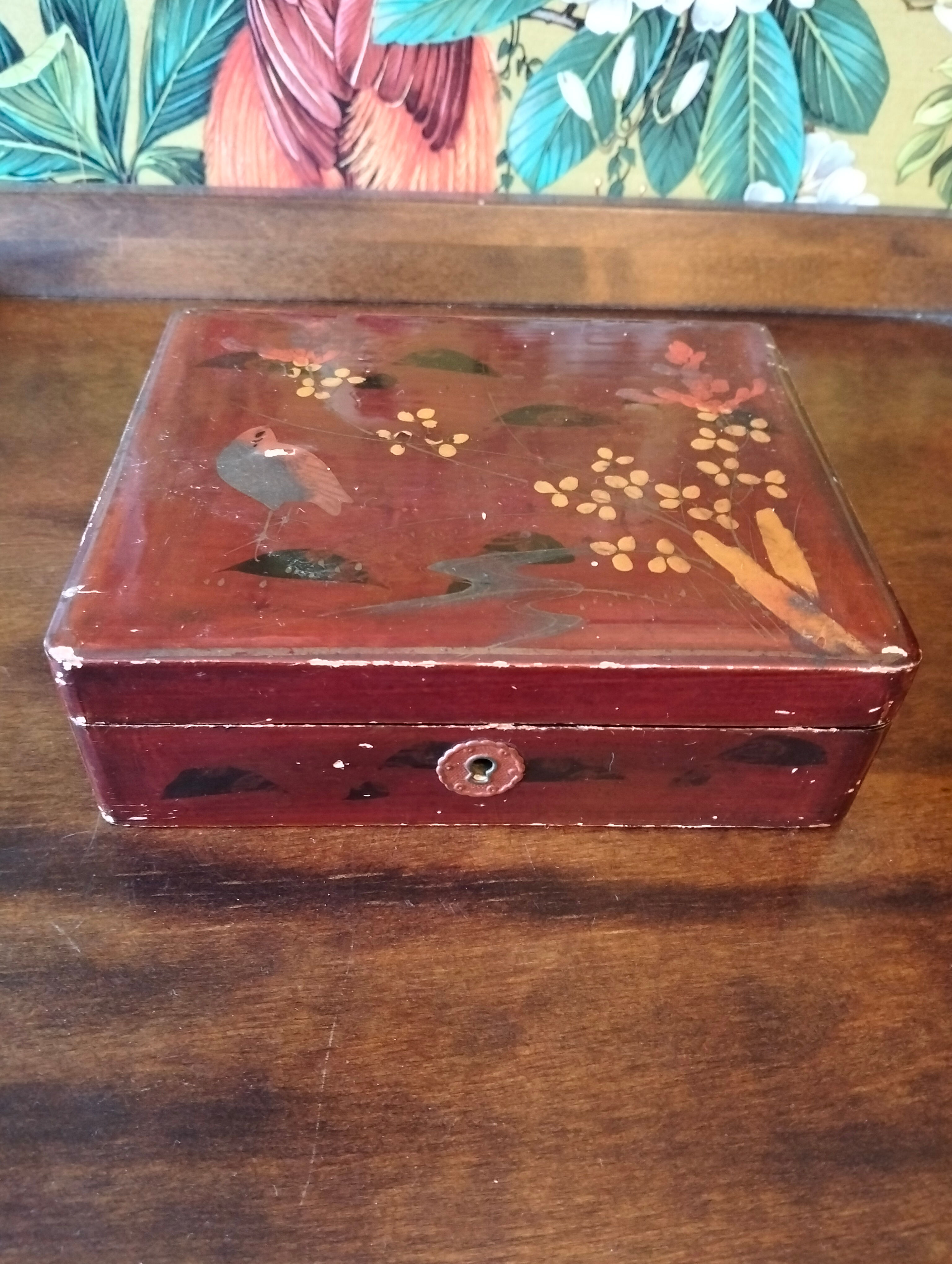 Vintage Chinese red lacquered box with hand painted bird decoration