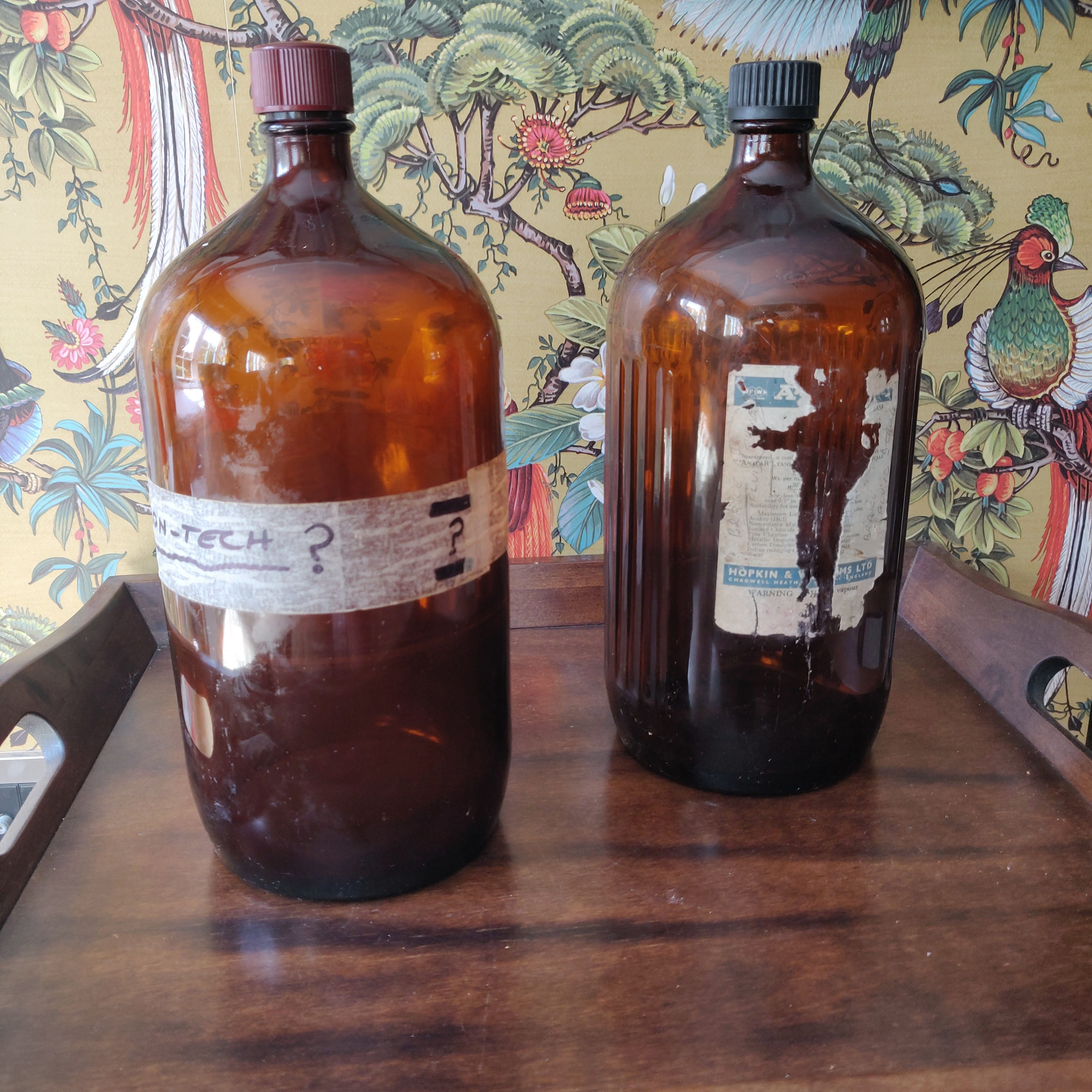 Vintage pair of large apothecary chemist bottles remnants of labels remaining