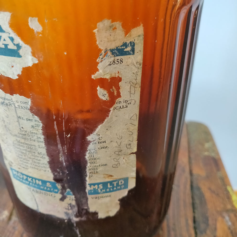 Vintage pair of large apothecary chemist bottles remnants of labels remaining
