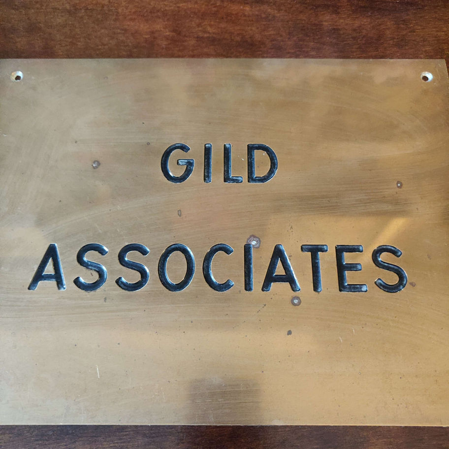 Vintage brass name plate gild associates