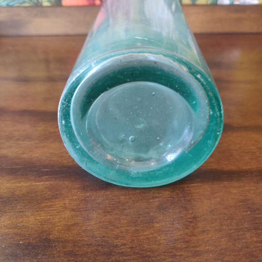 Vintage large green decorative glass bottle