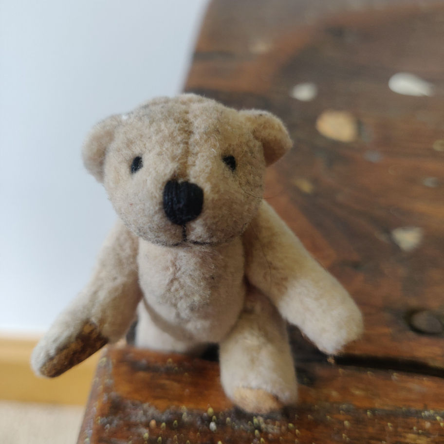 Vintage miniature mohair hand stitched bear with the cutest face