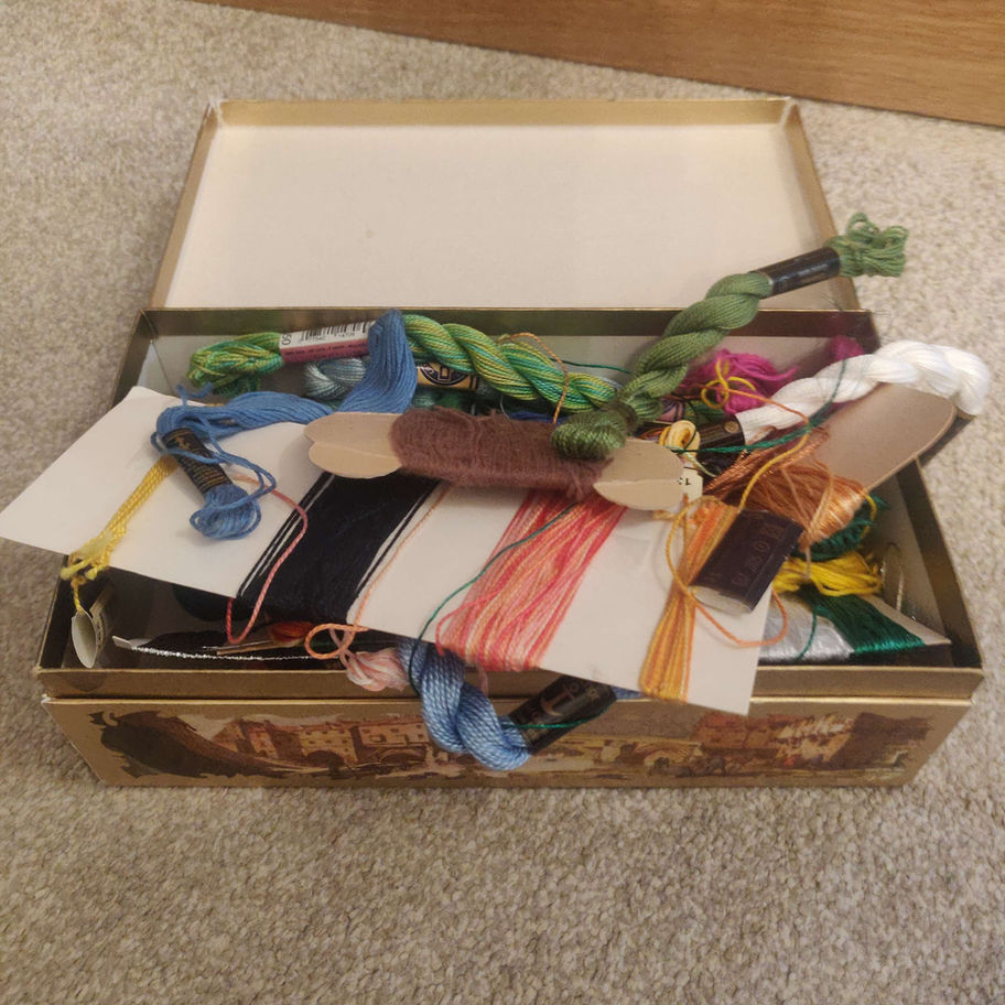 Vintage Terry's chocolate box with an abundance of wool and nylon sewing thread