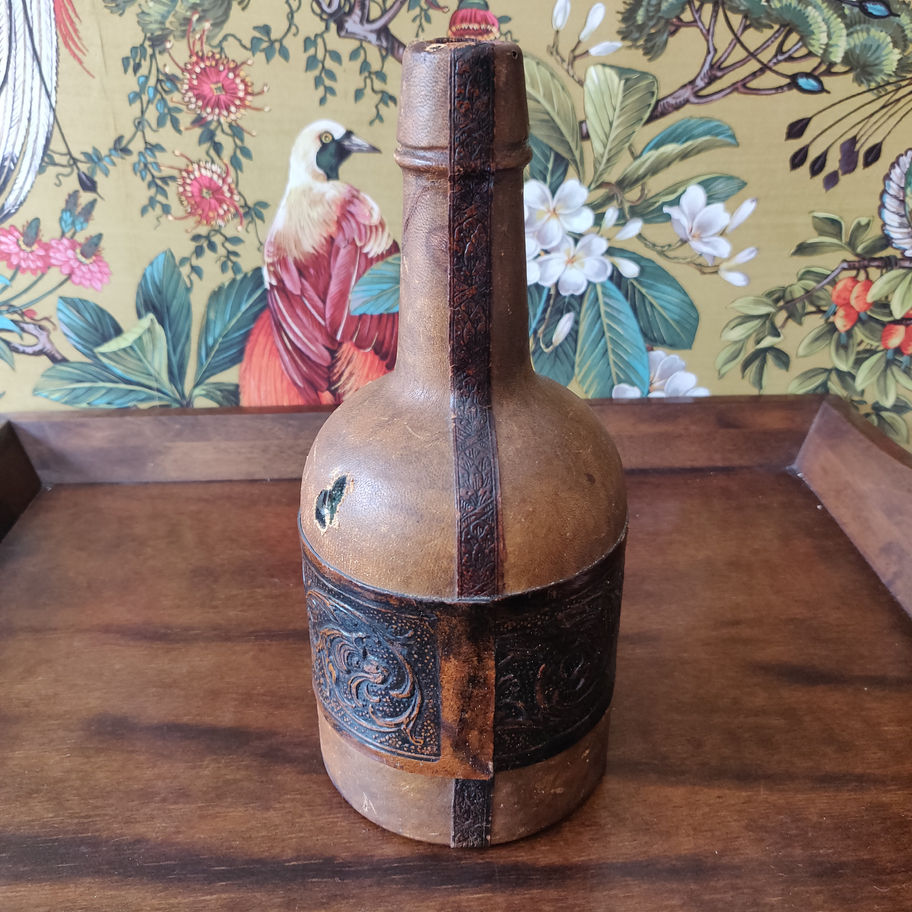 Vintage Italian leather bound glass decanter lovely decorative item
