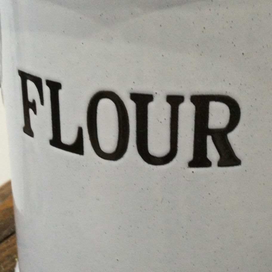 Vintage white and blue enamel flour bin