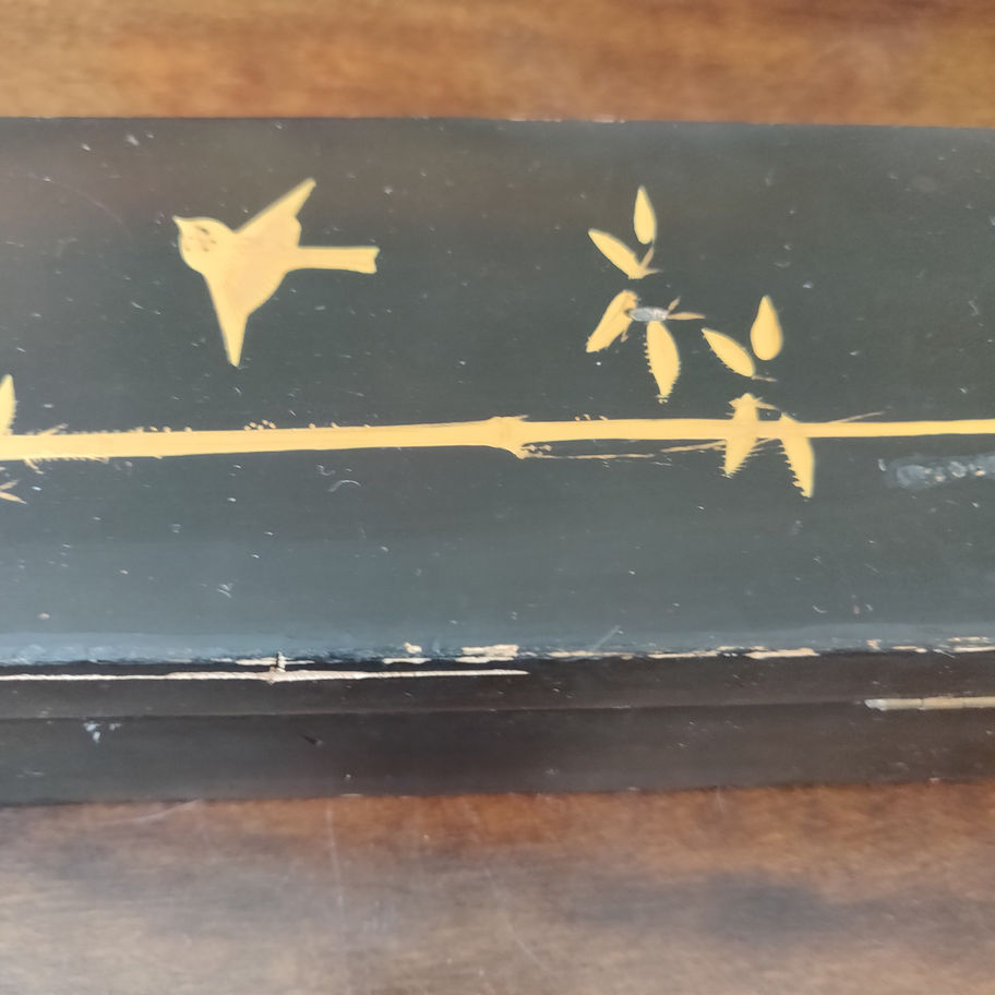 Antique early 20th century or late 19th century laquared and gold leaf glove box