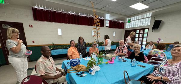 2024 Tampa Orchid Club Installation Luncheon members at their table
