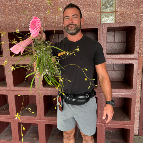 Scott Baranek Member's choice bloom table winner at the May Tampa Orchid Club Meeting