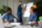 Side view nurses studying together