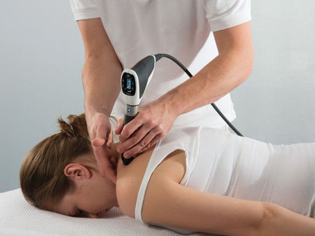 Women receiving shockwave therapy