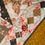 Thumbnail: Handmade floral patchwork lap size quilt