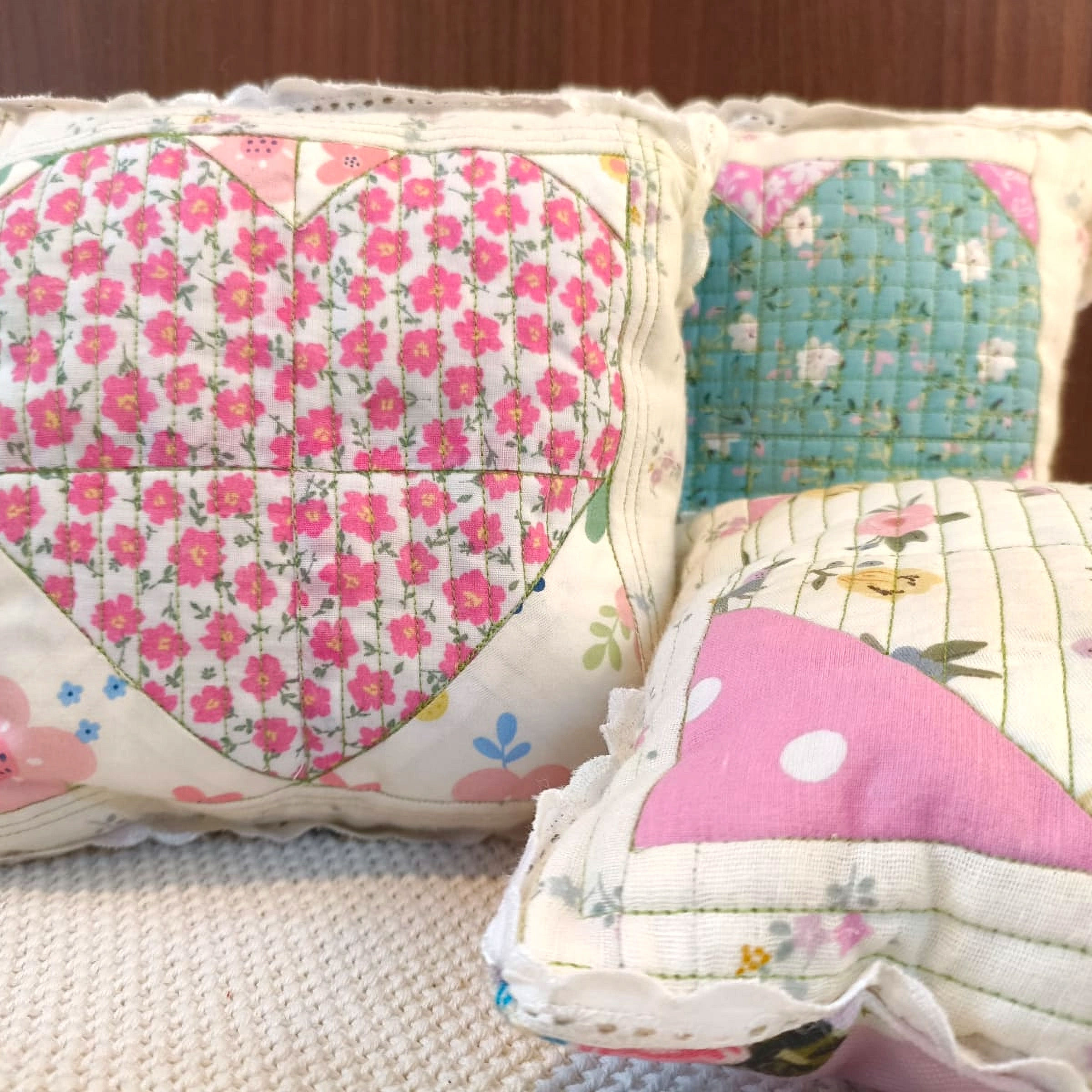 Set of 3 handmade quilted baby cushions