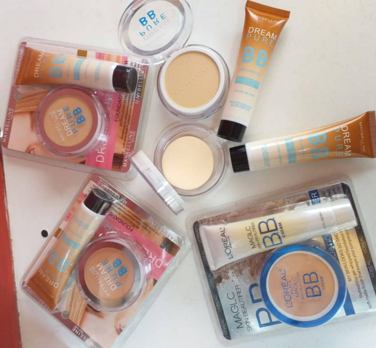 Base liquida + polvo LOREAL O MAYBELINE