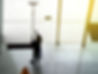 Silhouette of a man is cleaning the windows in the building.jpg