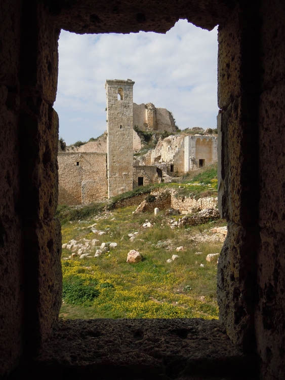 Ruined city through window Syria