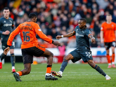 Tawanda battling Adegboyega in our last outing to Tannadice.