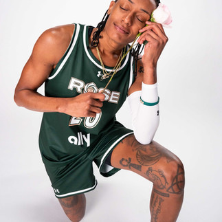Brittney Sykes poses with a rose wearing her Rose BC uniform for Unrivaled media day.