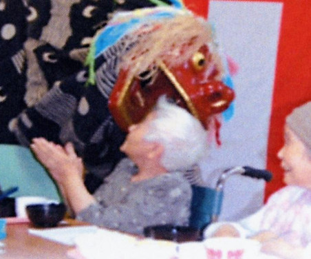 獅子舞と老人