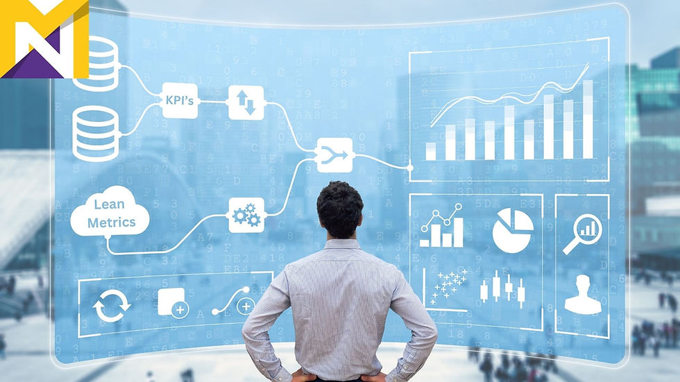A man looking at a screen Understanding Lean Metrics And KPIs